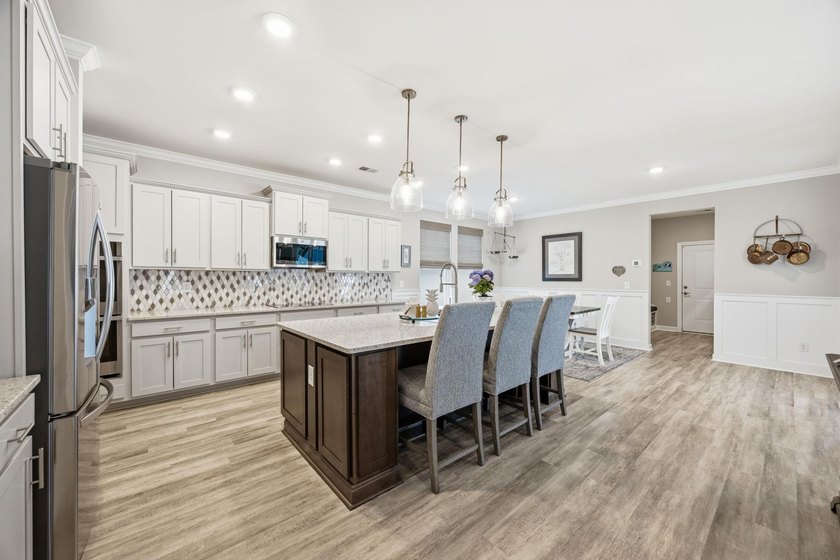 Experience effortless coastal living in this beautifully - photo 14