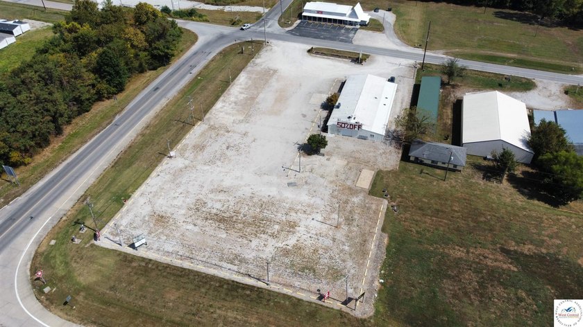 Commercial building and large tract located at the corner of 65 - photo 17