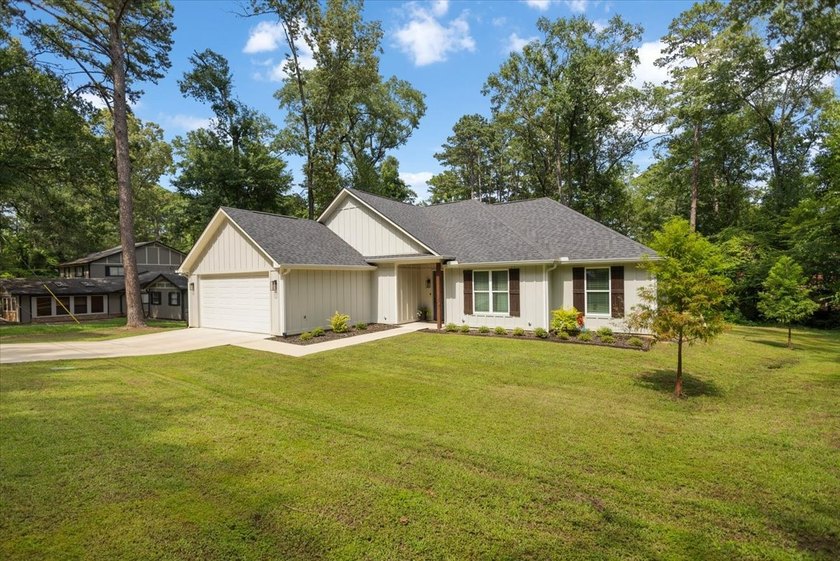 Almost new and brimming with farmhouse charm, this four bedroom - photo 2
