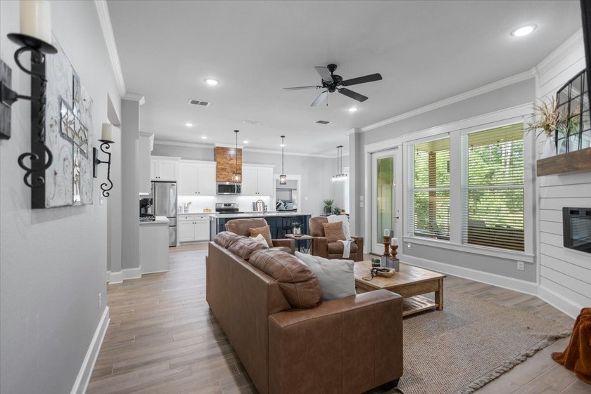 Almost new and brimming with farmhouse charm, this four bedroom - photo 8