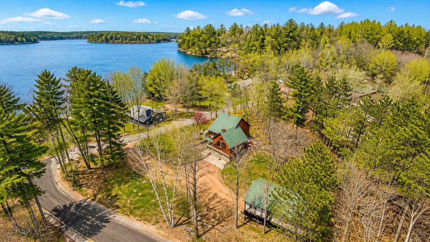 Escape to the beauty of the Northwoods with this one-of-a-kind - photo 2