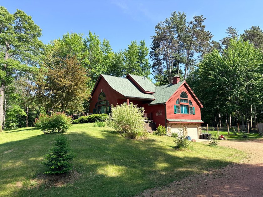 Escape to the beauty of the Northwoods with this one-of-a-kind - photo 3