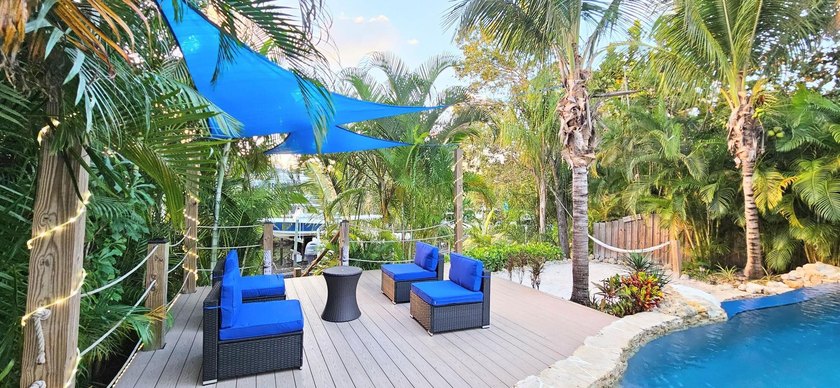 Price reduced to Sell! Don't miss out on this ocean access, pool - photo 6