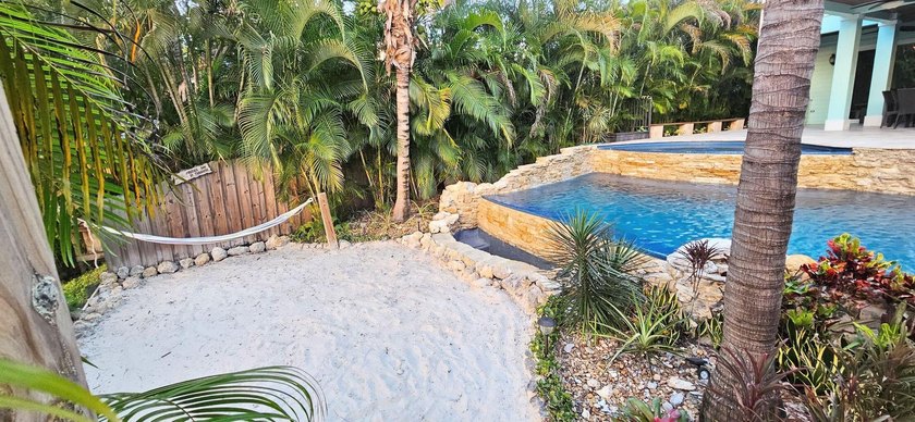 Price reduced to Sell! Don't miss out on this ocean access, pool - photo 7
