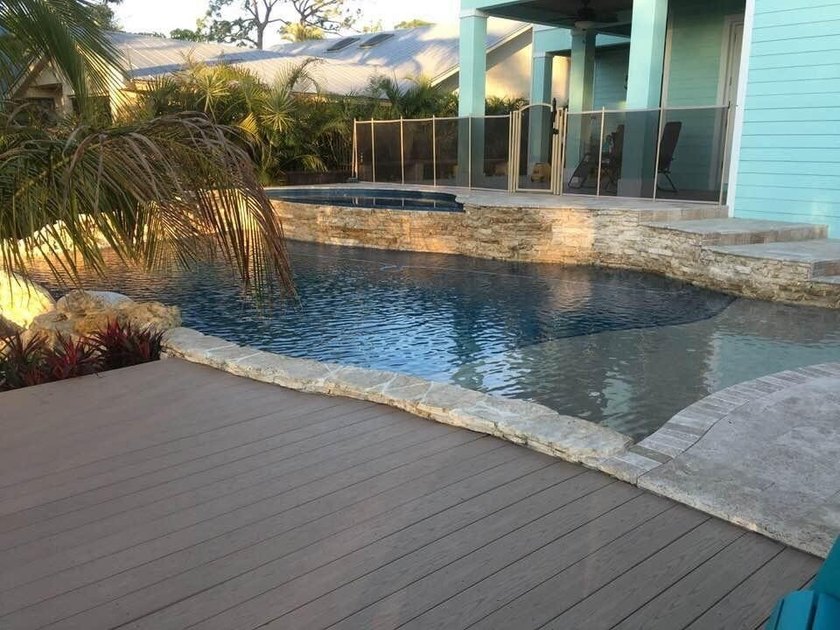 Price reduced to Sell! Don't miss out on this ocean access, pool - photo 9