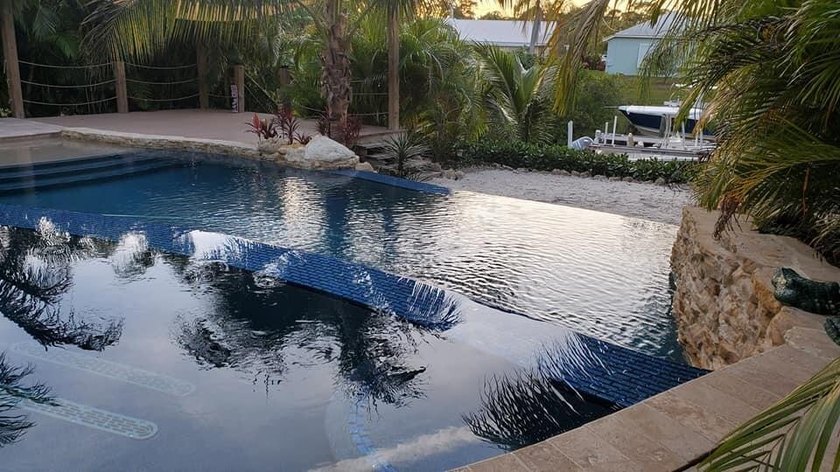 Price reduced to Sell! Don't miss out on this ocean access, pool - photo 10
