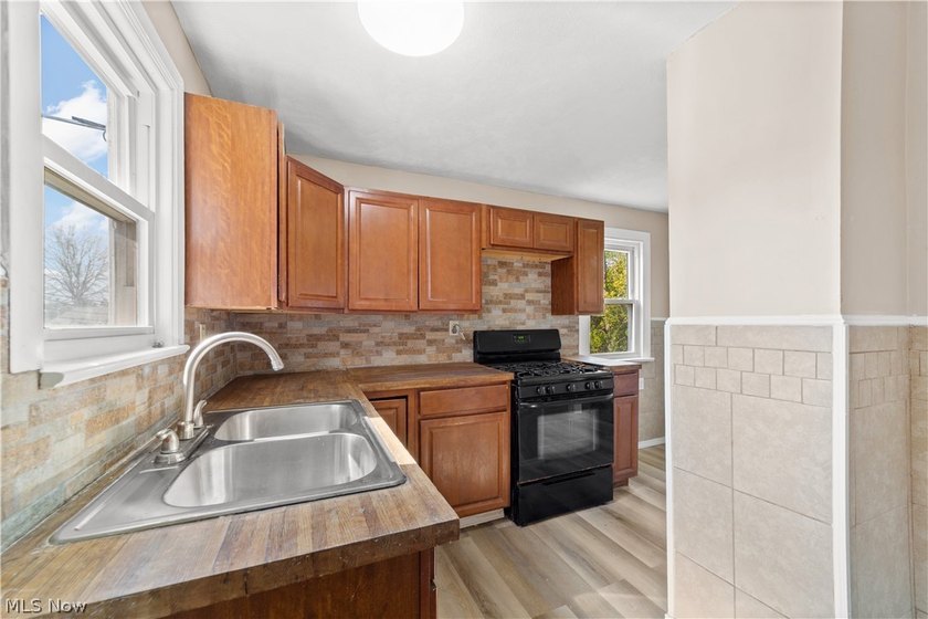 Welcome to 17904 Neff Rd in Euclid, a charming home located on a - photo 11