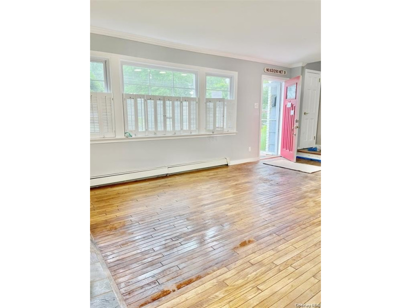 Sun-Drenched Expanded Brick Ranch in Kings Point Village! - photo 3