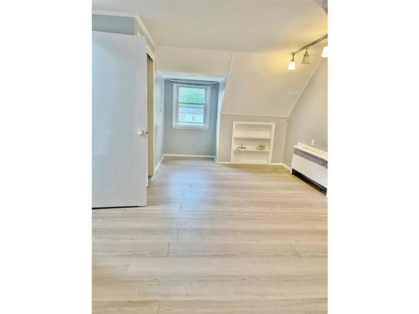 Sun-Drenched Expanded Brick Ranch in Kings Point Village! - photo 7