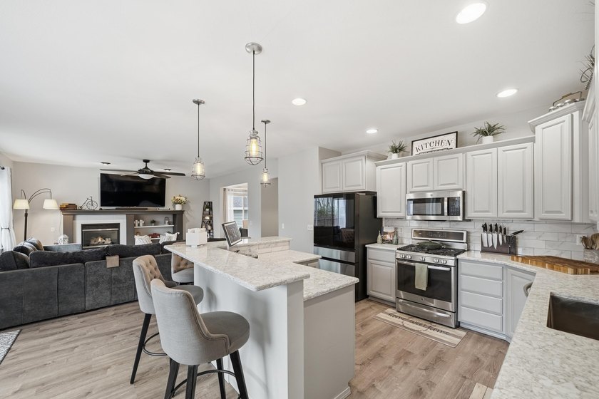 Step into an entertainer's dream with 5 bedrooms, 4 baths, and 3 - photo 6