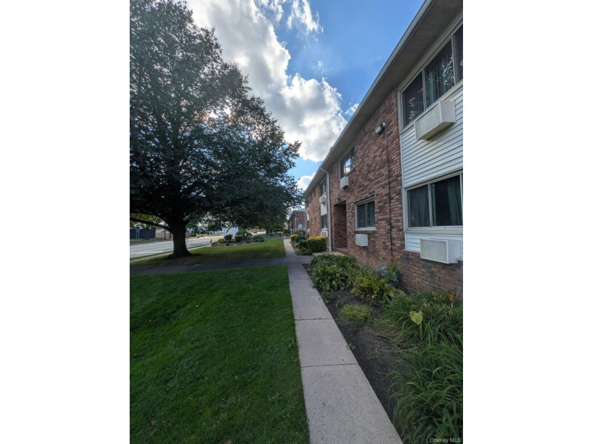 Discover your new beginning in the heart of Islip! This spacious - photo 9