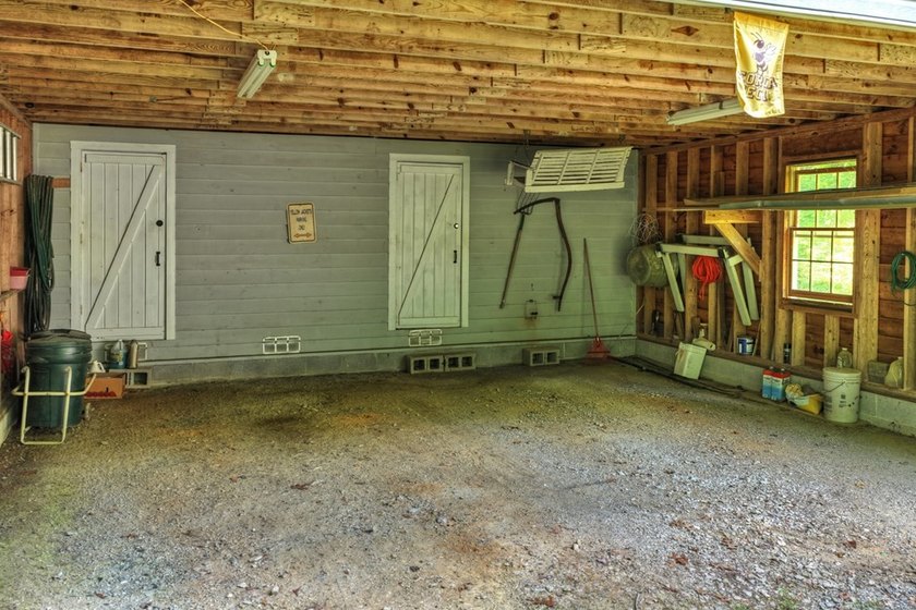 Charming cottage home nestled on nearly 7 private wooded acres - photo 22