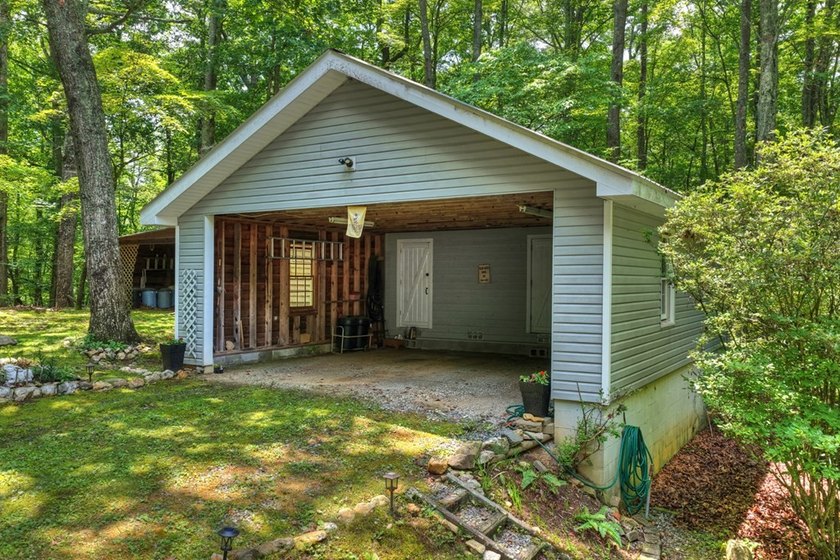 Charming cottage home nestled on nearly 7 private wooded acres - photo 31