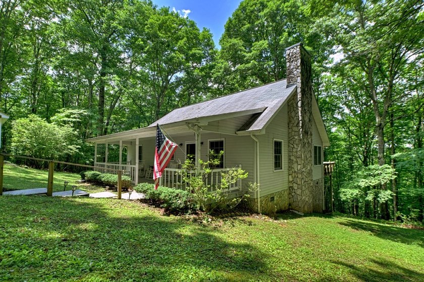 Charming cottage home nestled on nearly 7 private wooded acres - photo 38