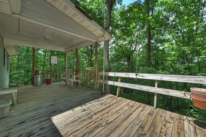 Charming cottage home nestled on nearly 7 private wooded acres - photo 45