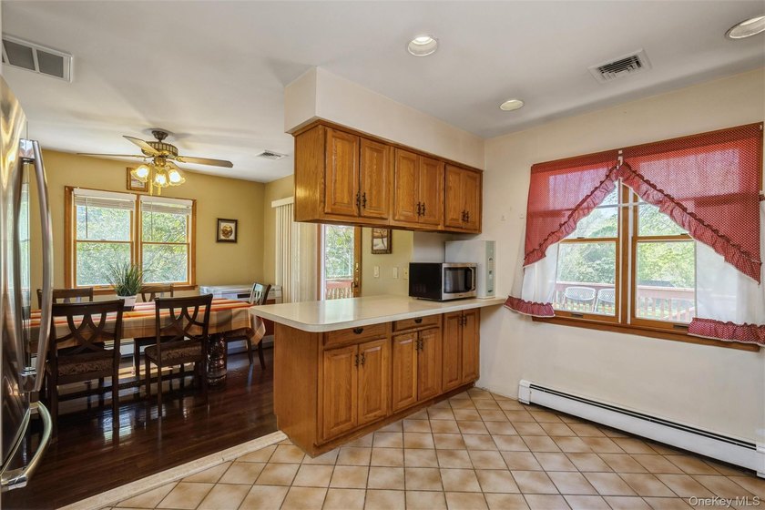 Nestled in a quiet, sought-after Huntington neighborhood, this - photo 29
