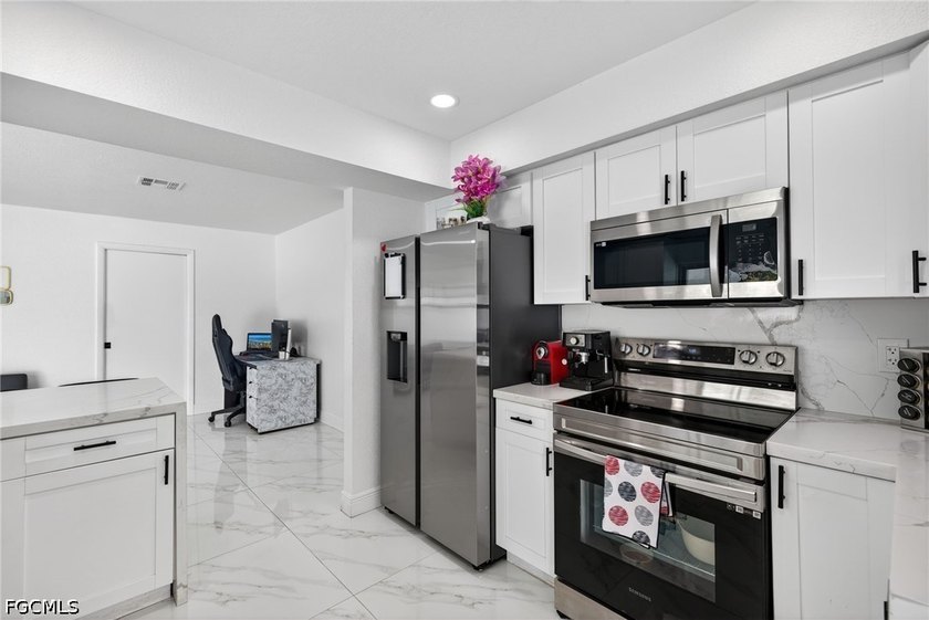 Beautifully updated 3-bedroom, 2-bath home situated on an - photo 3
