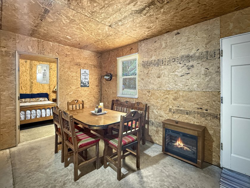SECLUDED! Tucked away on 1.75 wooded acres, this cute 3-bedroom - photo 6