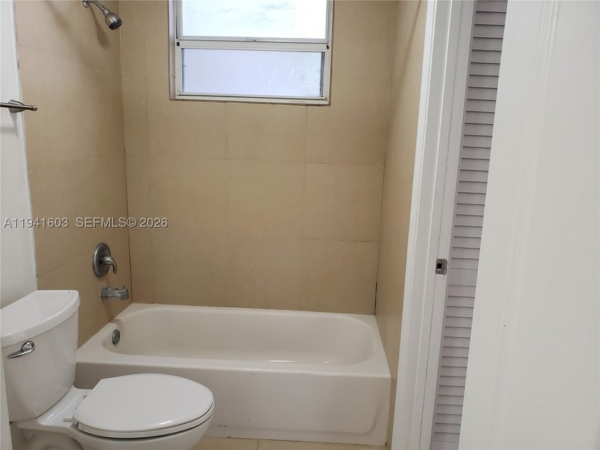 Spacious 1/1 bath unit with canal view located in a desirable - photo 11