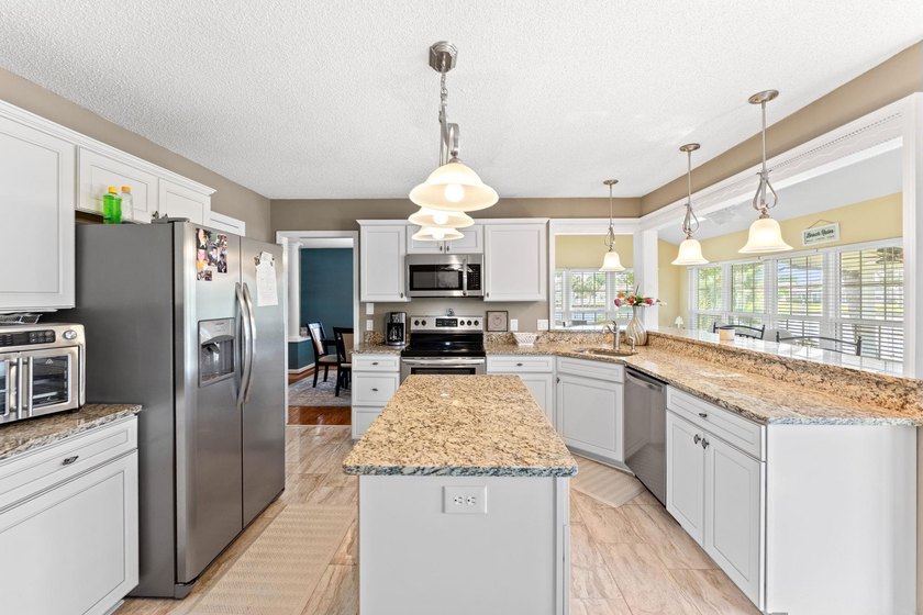 Welcome to this beautiful 4-bedroom, 2.5-bath waterfront home - photo 8