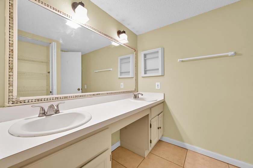 Welcome to this charming 2-bedroom, 1.5-bath townhouse featuring - photo 26