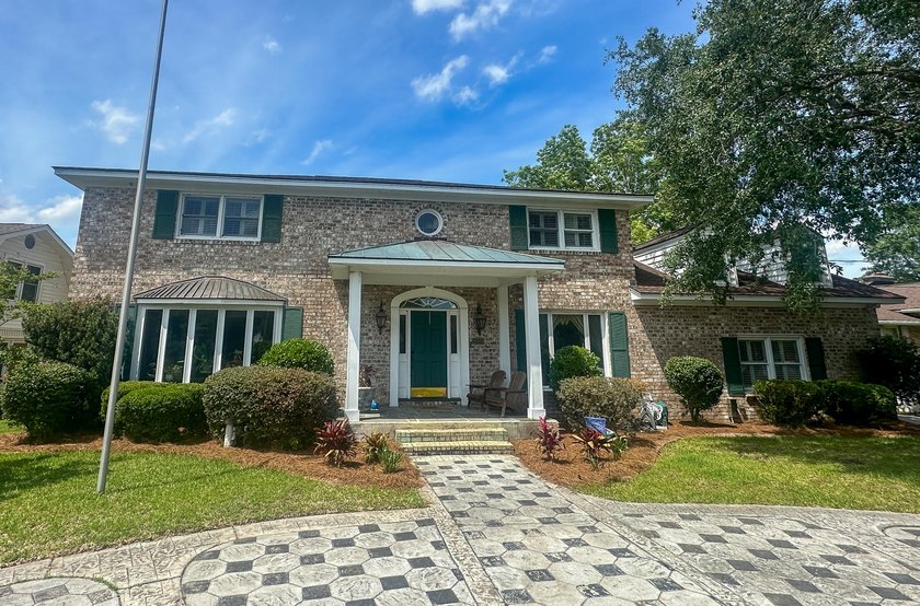 This waterfront tidal creek home is only minutes from Downtown - photo 3