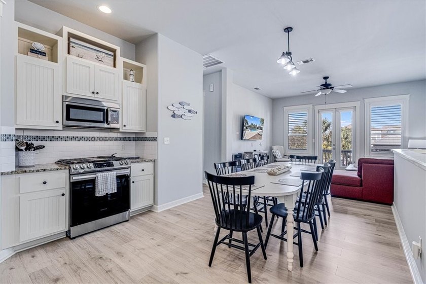 Coastal elegance meets modern comfort in this beautifully - photo 13