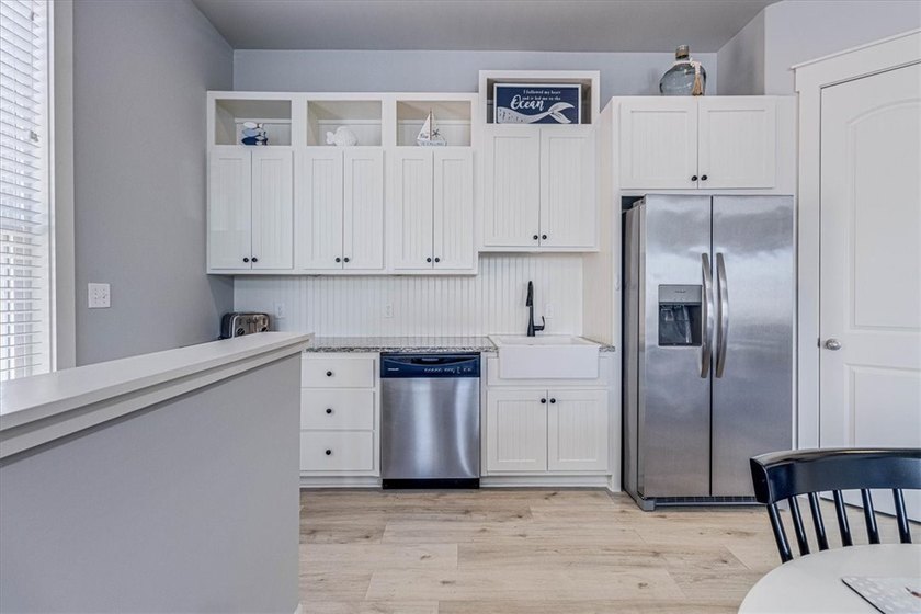 Coastal elegance meets modern comfort in this beautifully - photo 14