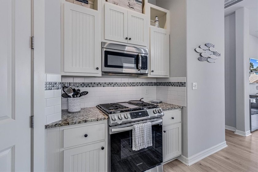 Coastal elegance meets modern comfort in this beautifully - photo 15