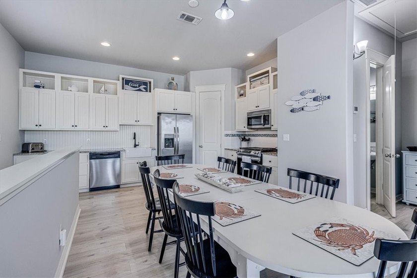 Coastal elegance meets modern comfort in this beautifully - photo 16