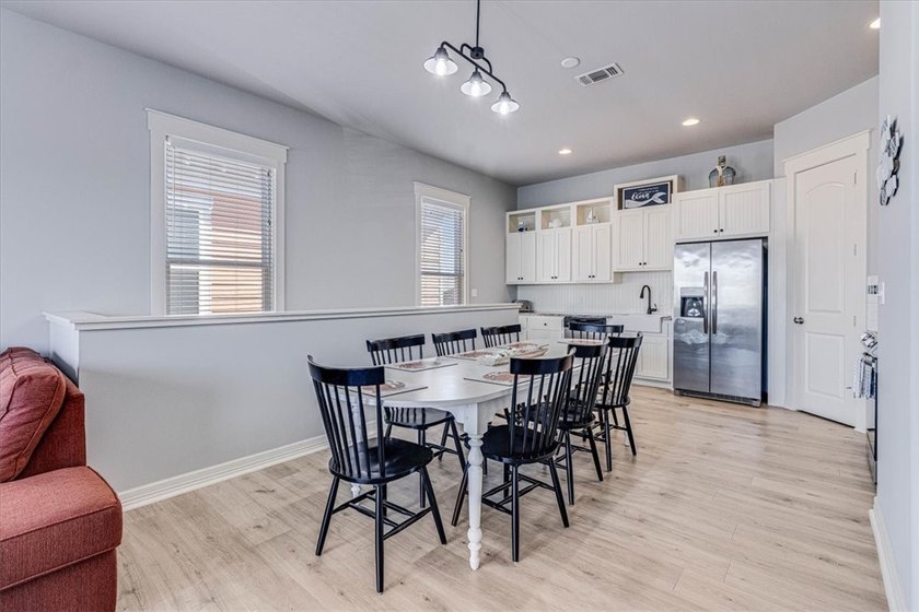 Coastal elegance meets modern comfort in this beautifully - photo 17
