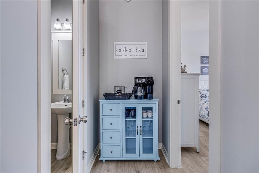 Coastal elegance meets modern comfort in this beautifully - photo 22
