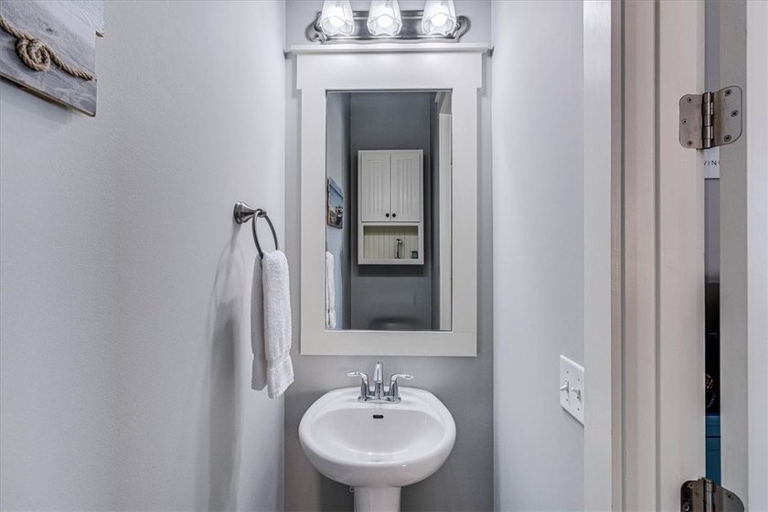 Coastal elegance meets modern comfort in this beautifully - photo 23