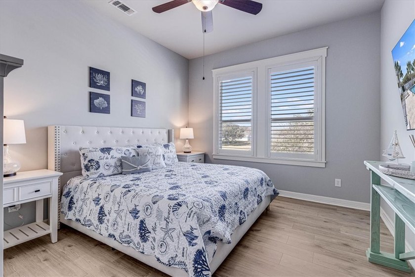 Coastal elegance meets modern comfort in this beautifully - photo 24