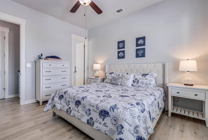 Coastal elegance meets modern comfort in this beautifully - photo 26
