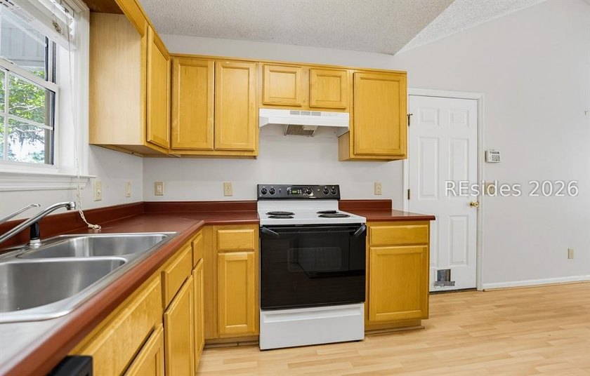 Set on a quiet street, 27 Telfair Drive offers a rare chance to - photo 15