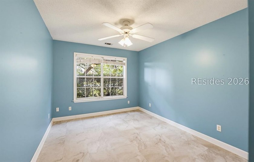 Set on a quiet street, 27 Telfair Drive offers a rare chance to - photo 18