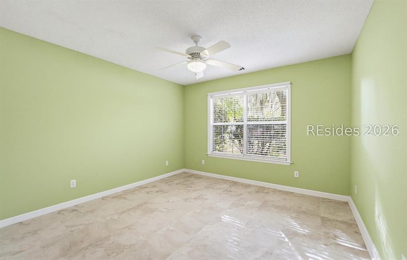 Set on a quiet street, 27 Telfair Drive offers a rare chance to - photo 21