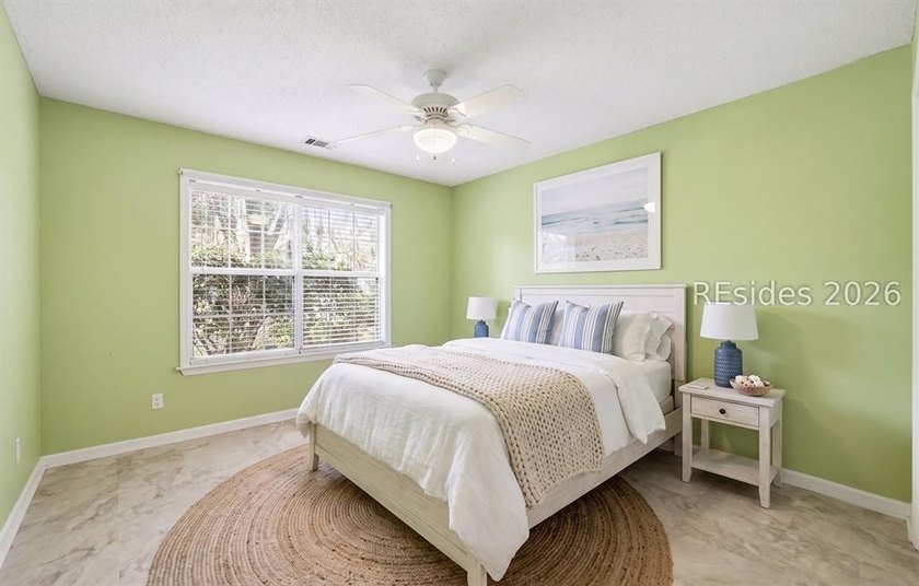 Set on a quiet street, 27 Telfair Drive offers a rare chance to - photo 22