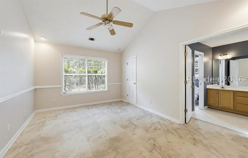 Set on a quiet street, 27 Telfair Drive offers a rare chance to - photo 25