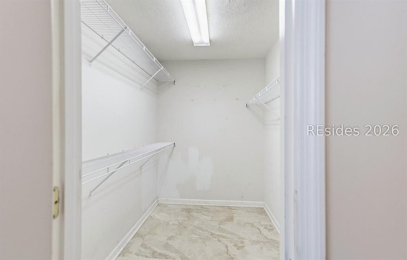 Set on a quiet street, 27 Telfair Drive offers a rare chance to - photo 28