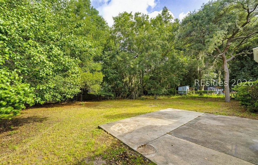 Set on a quiet street, 27 Telfair Drive offers a rare chance to - photo 34