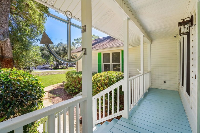 Nestled on a large, shaded 0.48-acre corner lot in the heart of - photo 8