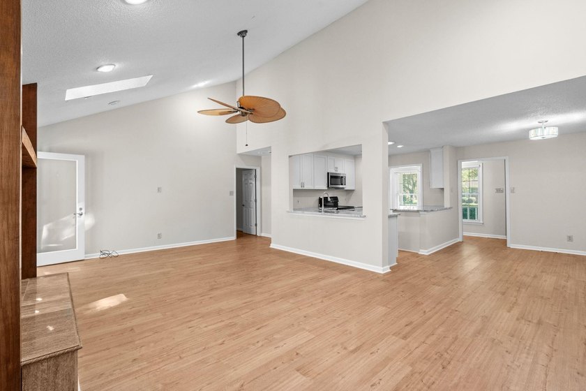 Nestled on a large, shaded 0.48-acre corner lot in the heart of - photo 10