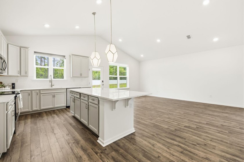 Welcome to 8663 Farrier Drive in the highly sought-after - photo 7