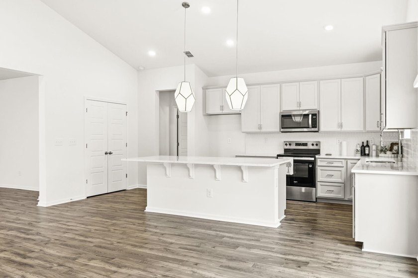 Welcome to 8663 Farrier Drive in the highly sought-after - photo 8