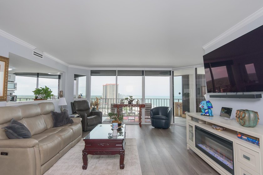 A truly stunning oceanfront gem! Fully remodeled in 2024, this - photo 4