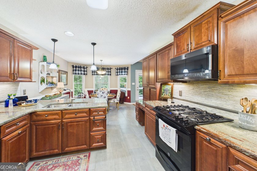 Welcome to this beautifully maintained home located in the - photo 14
