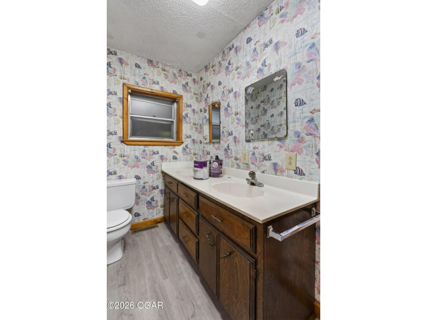 Welcome home to this solid 3-bedroom, 2.5-bath brick home - photo 26