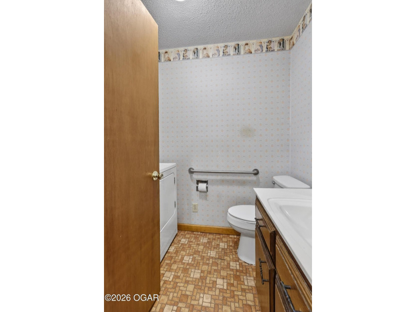 Welcome home to this solid 3-bedroom, 2.5-bath brick home - photo 27